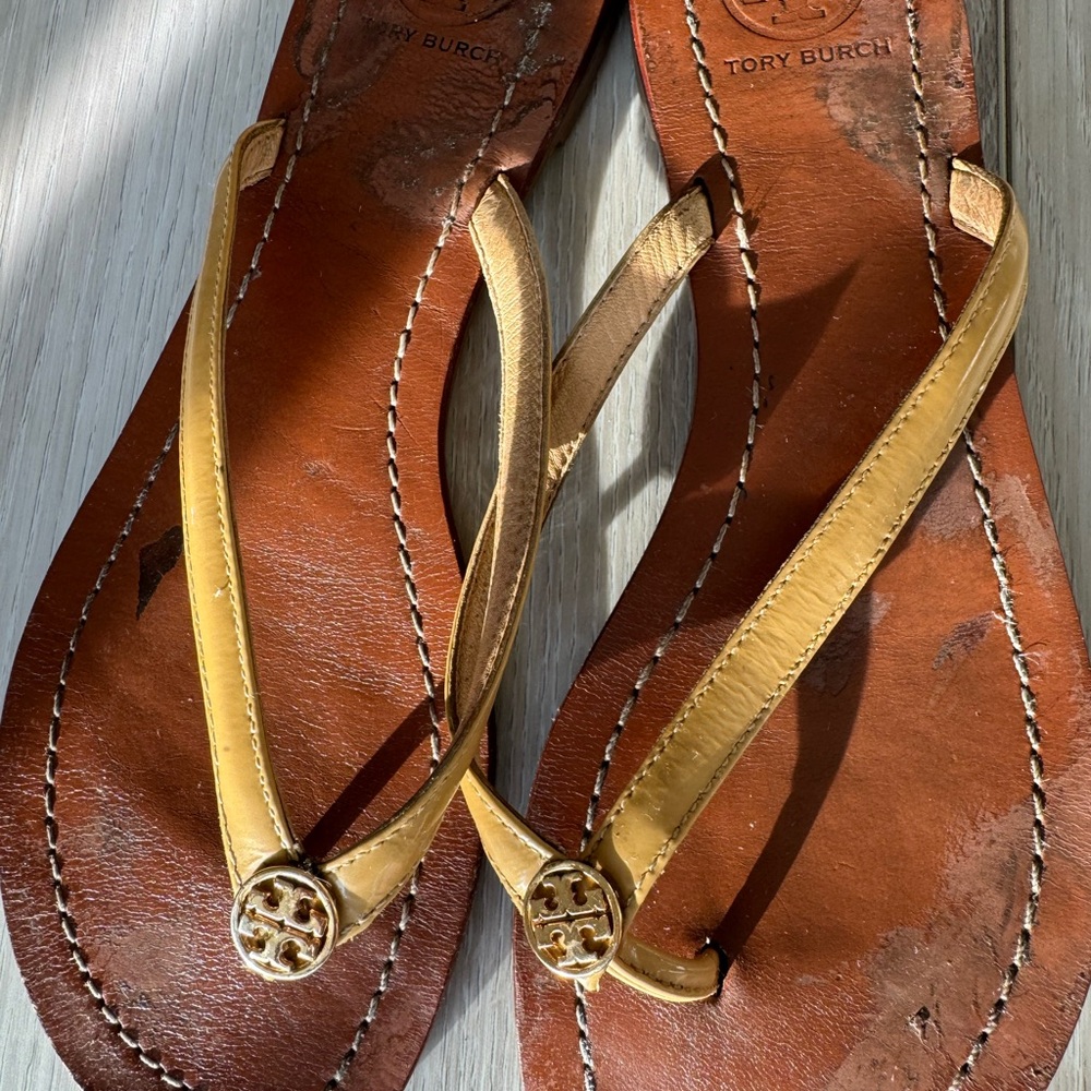 Tory Burch Gold Leather Flip Flops